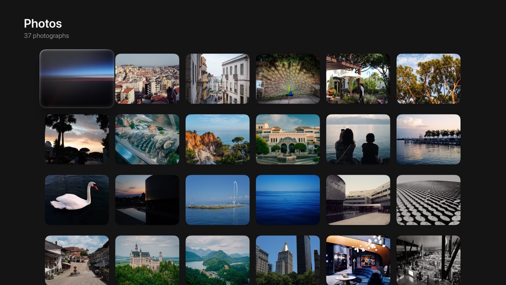 Baryta on Apple TV. A grid of 37 photographs on the television, the focus on the first tile.